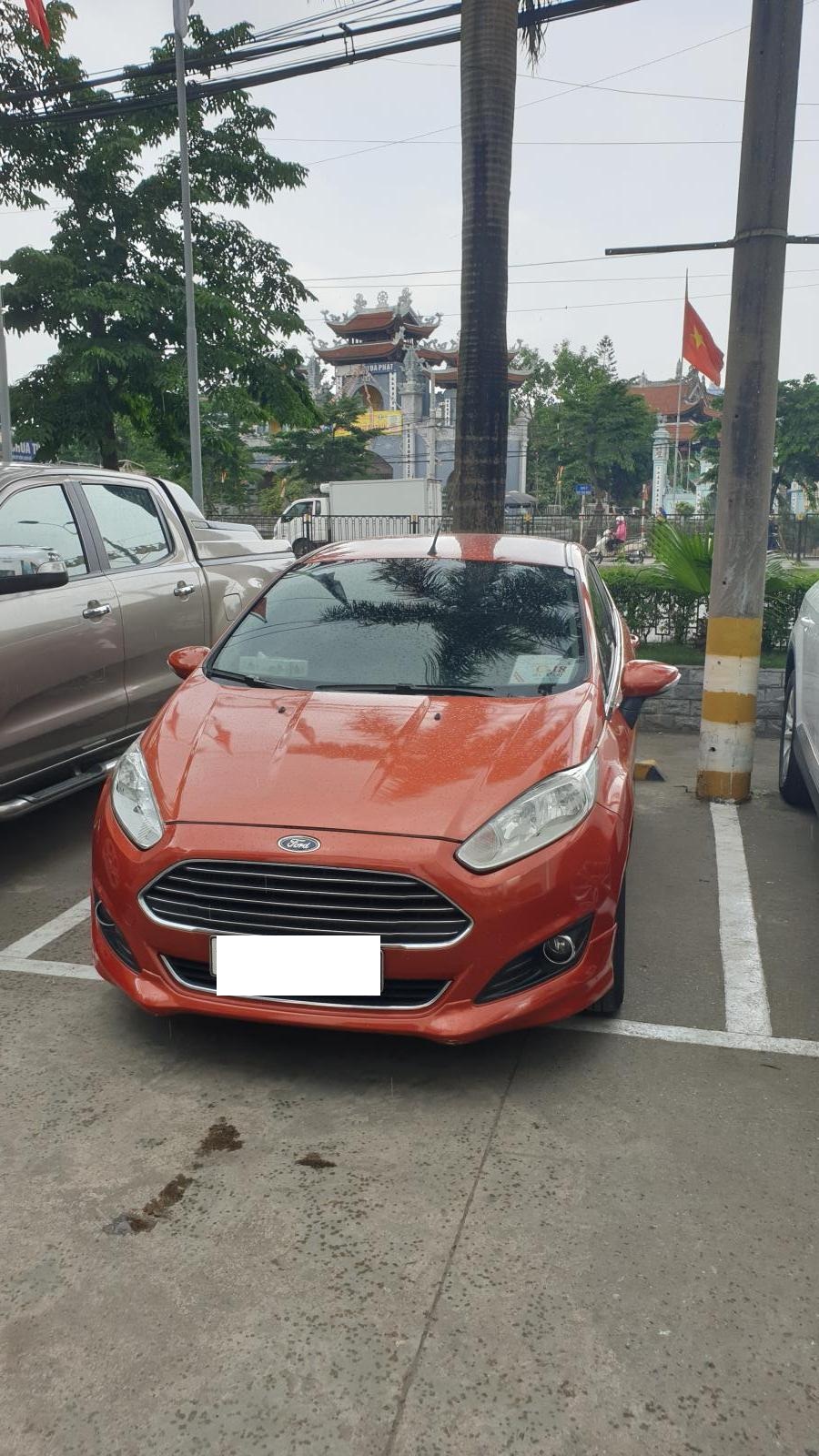 Ford Fiesta 1.0 2013 - Bán ô tô Ford Fiesta sản xuất năm 2013, màu cam, 1 chủ từ đầu