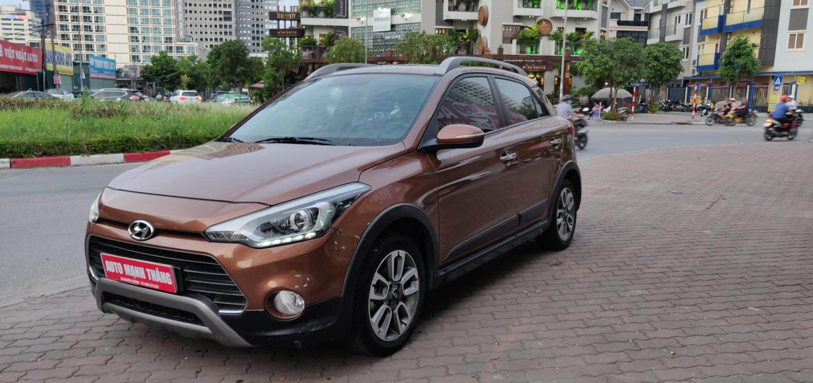 Hyundai i20 Active 1.4 AT 2015 - Bán xe Hyundai i20 Active 1.4 AT sản xuất 2015, màu nâu, nhập khẩu