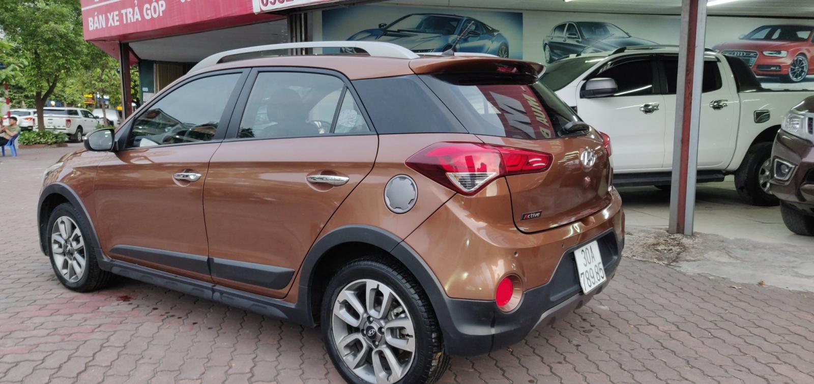 Hyundai i20 Active 1.4 AT 2015 - Bán xe Hyundai i20 Active 1.4 AT sản xuất 2015, màu nâu, nhập khẩu