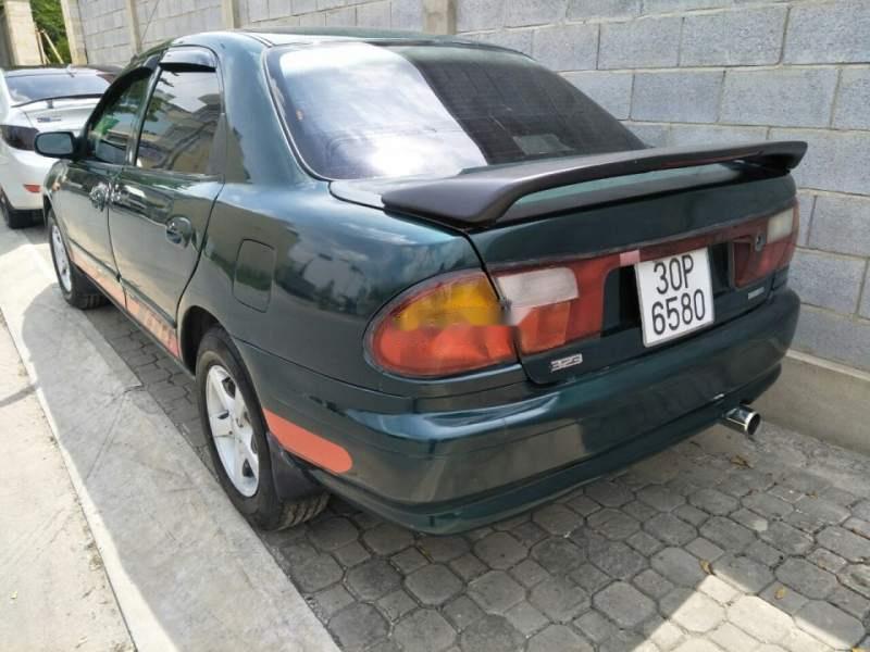 Mazda 323   2000 - Bán xe Mazda 323 Sx 2000, xe còn đẹp, không đâm đụng, không mục