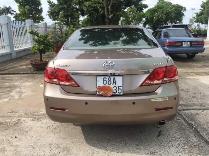 Toyota Camry  2.4G   2007 - Cần bán gấp Toyota Camry 2.4G sản xuất năm 2007, màu nâu, xe một đời chủ, chạy rất êm