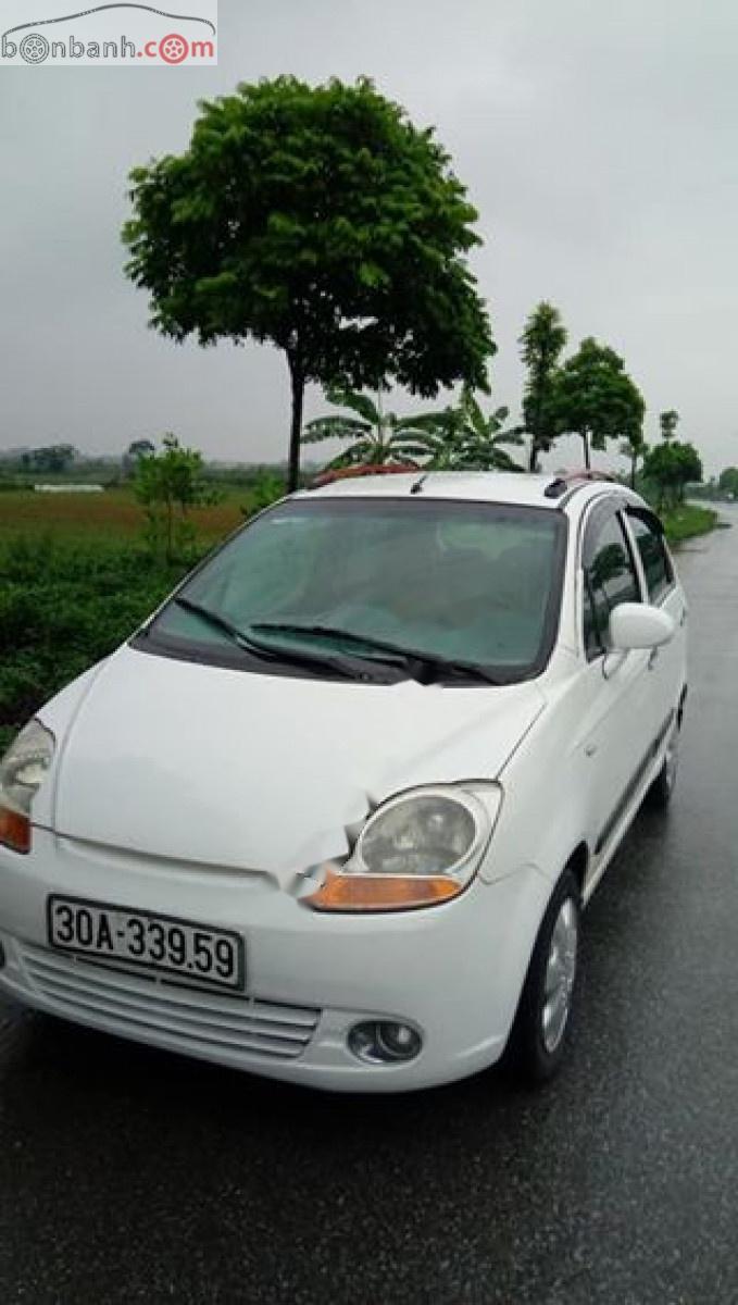 Chevrolet Spark LT 0.8 MT 2009 - Bán Chevrolet Spark LT 0.8 MT đời 2009, màu trắng, số sàn