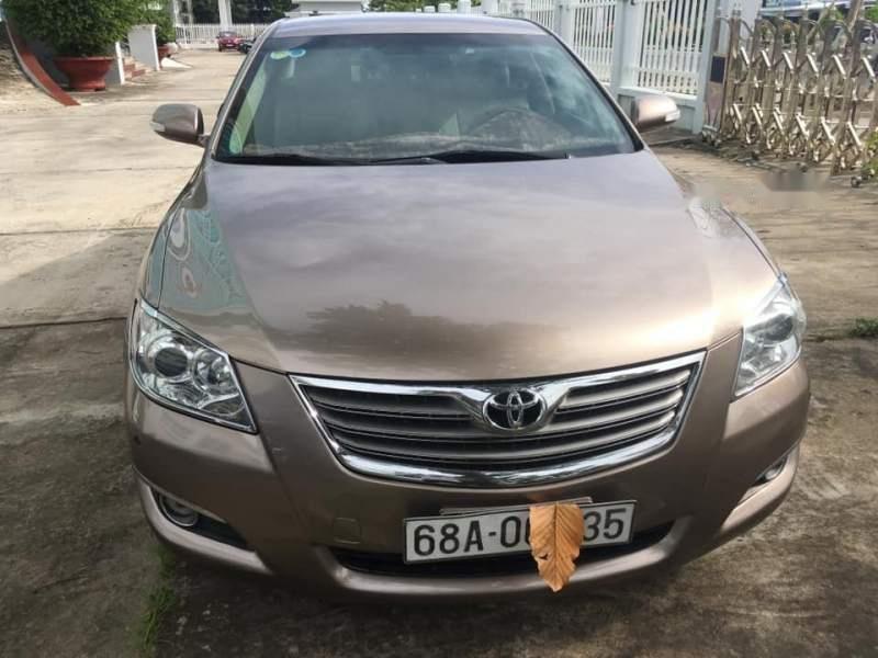 Toyota Camry  2.4G   2007 - Cần bán gấp Toyota Camry 2.4G sản xuất năm 2007, màu nâu, xe một đời chủ, chạy rất êm