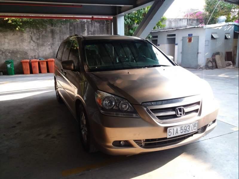 Honda Odyssey 2007 - Gia đình bán Honda Odyssey đời 2007, màu vàng, nhập khẩu