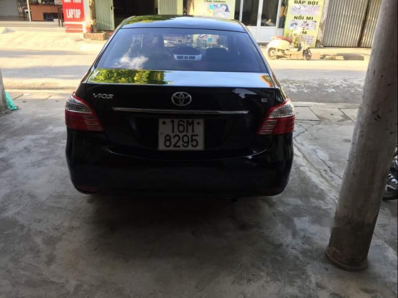 Toyota Vios E 2009 - Cần bán xe Toyota Vios E sản xuất 2009, màu đen, giá 240tr