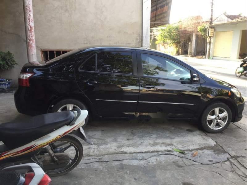 Toyota Vios E 2009 - Cần bán xe Toyota Vios E sản xuất 2009, màu đen, giá 240tr