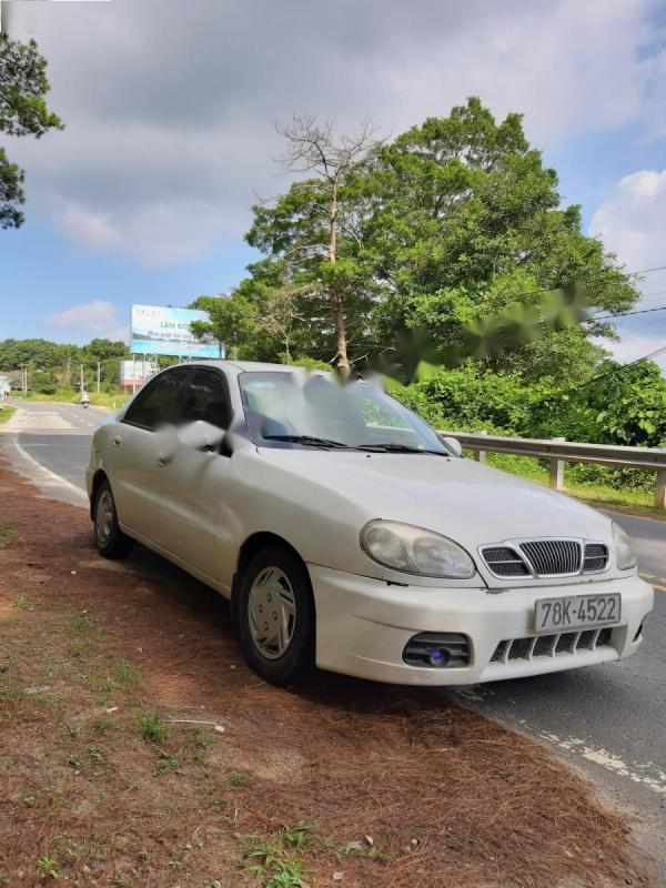 Daewoo Lanos SX 2005 - Cần bán Daewoo Lanos SX đời 2005, màu trắng