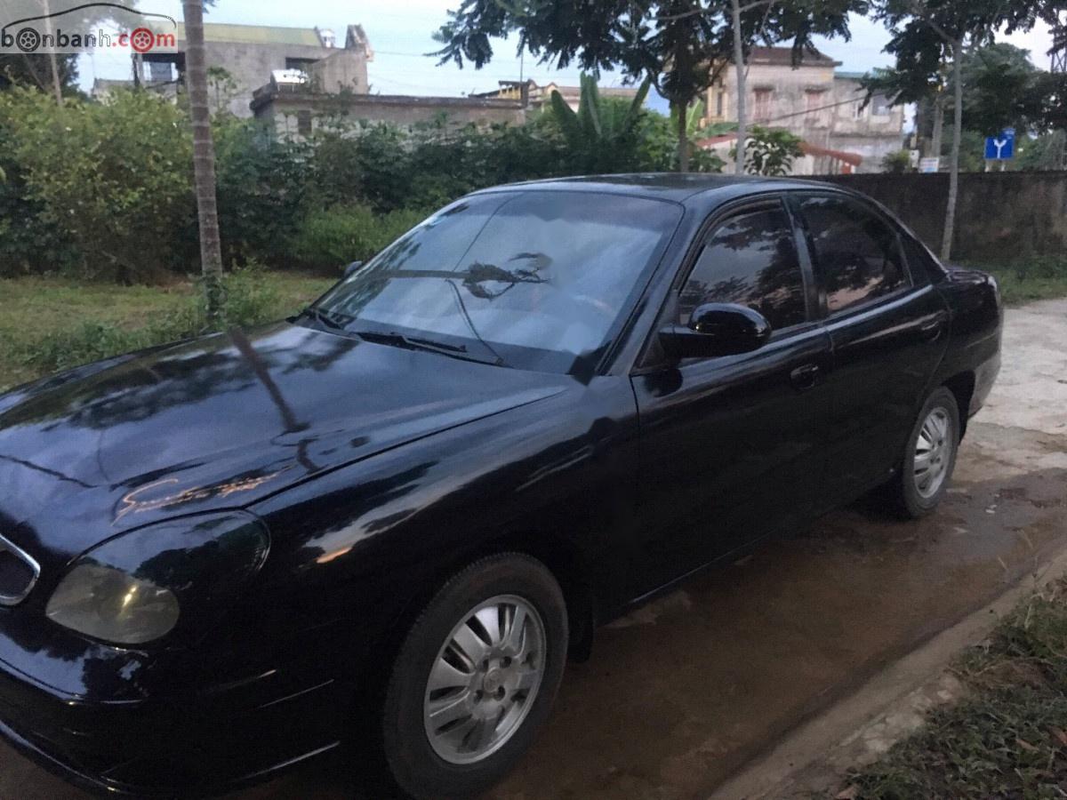 Daewoo Nubira II 1.6 2003 - Cần bán Daewoo Nubira II 1.6 sản xuất 2003, màu đen, nhập khẩu 