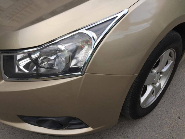 Chevrolet Cruze 2010 - Gia đình cần bán Cruze 2010, số sàn, màu vàng cát