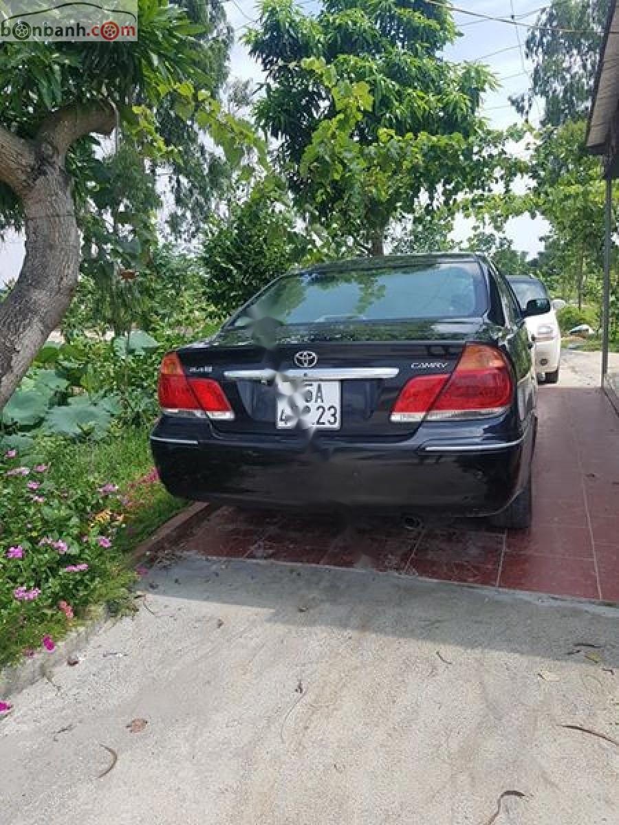 Toyota Camry 2.4G 2004 - Bán ô tô Toyota Camry 2.4G năm 2004, màu đen chính chủ 