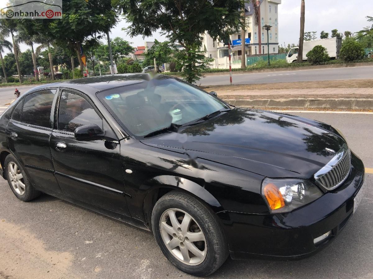 Daewoo Magnus 2005 - Bán ô tô Daewoo Magnus đời 2005, màu đen xe gia đình