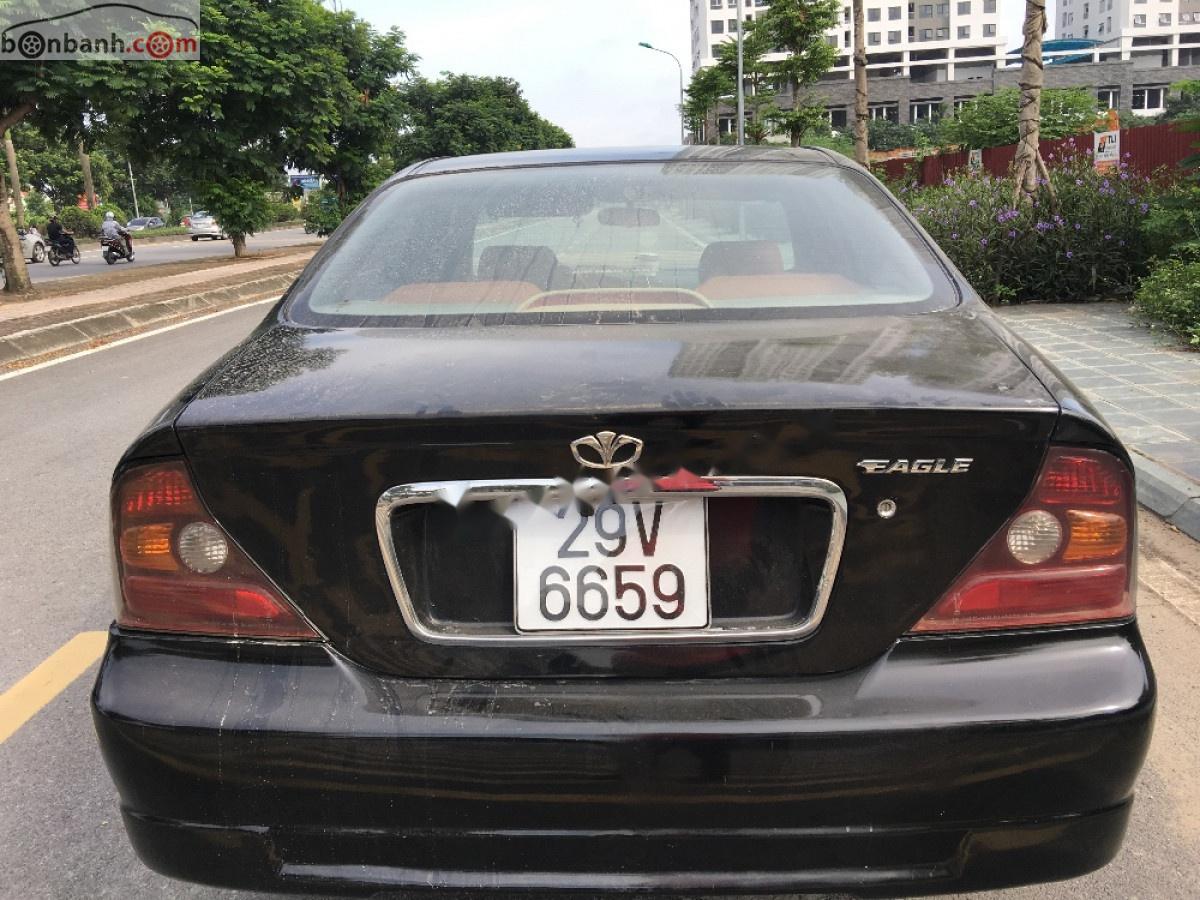 Daewoo Magnus 2005 - Bán ô tô Daewoo Magnus đời 2005, màu đen xe gia đình