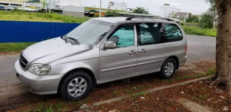 Kia Carnival V6 2.5 2009 - Chính chủ bán lại xe Kia Carnival V6 2.5 năm 2009, màu bạc