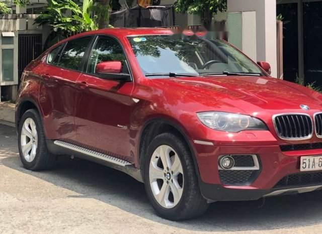 BMW X6  Xdrive35i  2013 - Bán BMW X6 Xdrive35i 2013 màu đỏ, xe chạy kiểng trong thành phố