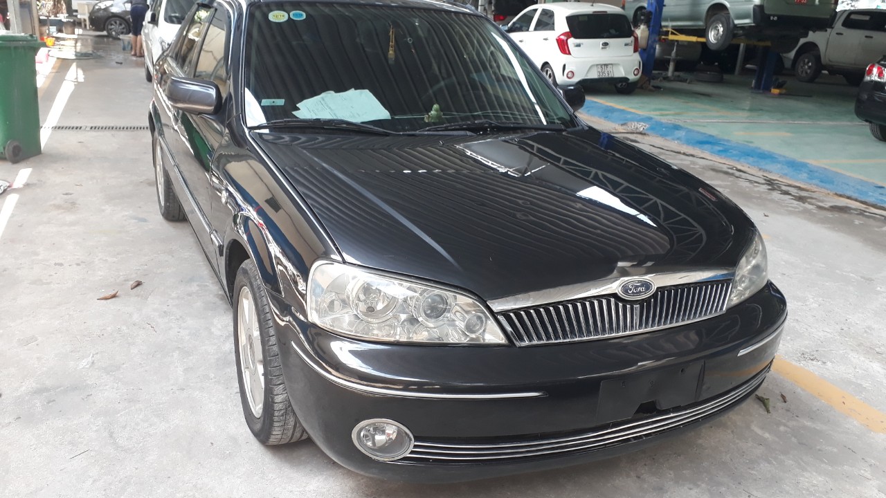 Ford Laser GHIA 1.8 2002 - Bán Ford Laser GHIA 1.8 đời 2004, màu xám (ghi), nhập khẩu nguyên chiếc