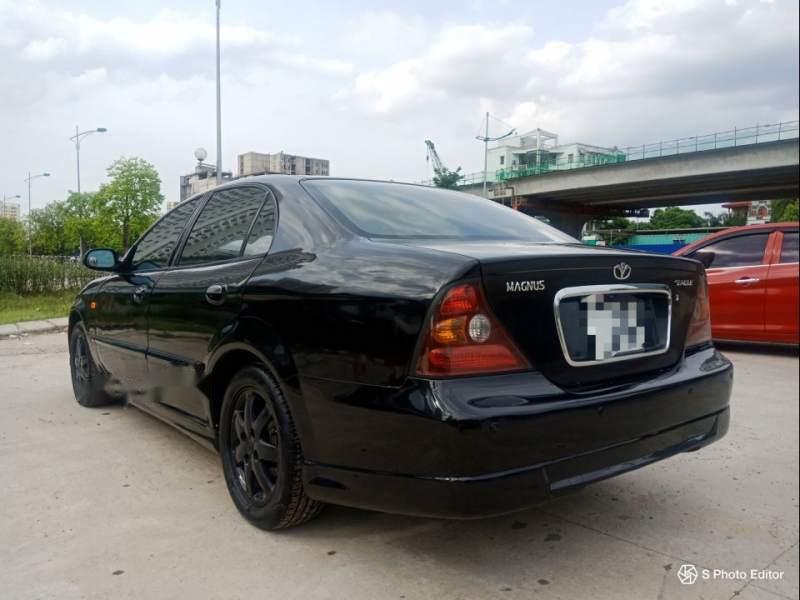 Daewoo Magnus 2004 - Bán Daewoo Magnus năm sản xuất 2004, màu đen, xe nhập