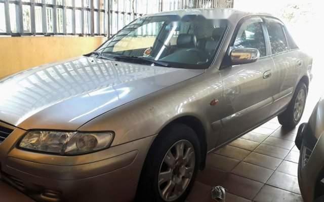 Mazda 626   2002 - Bán Mazda 626 năm sản xuất 2002, màu bạc, xe còn đẹp, máy khỏe, không hư hỏng