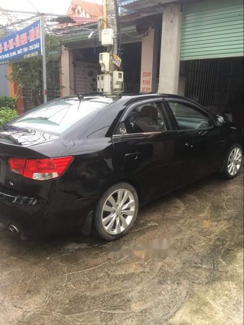 Kia Forte   2011 - Bán Kia Forte đời 2011, màu đen, đăng ký cuối 2011