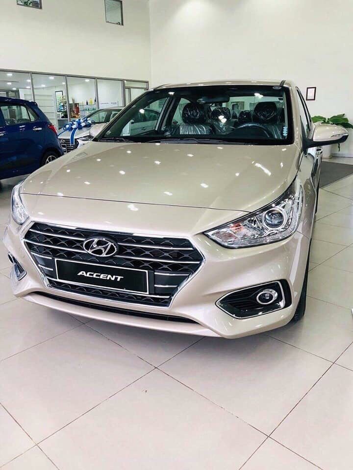 Hyundai Accent 1.4 MT 2019 - Bán ô tô Hyundai Accent 1.4 MT đời 2019, màu vàng cát