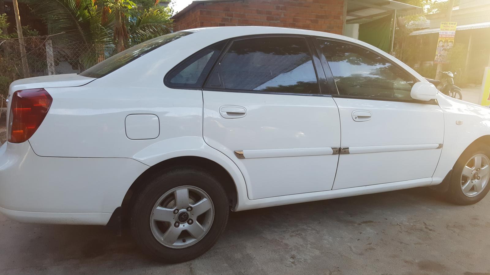 Daewoo Lacetti EX 2005 - Bán xe Daewoo Lacetti EX năm 2005, màu trắng. Xe như mới