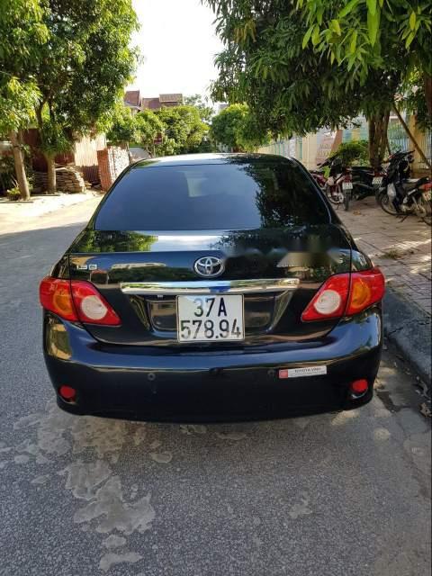 Toyota Corolla altis G 2010 - Cần bán lại xe Toyota Corolla altis G đời 2010, màu đen