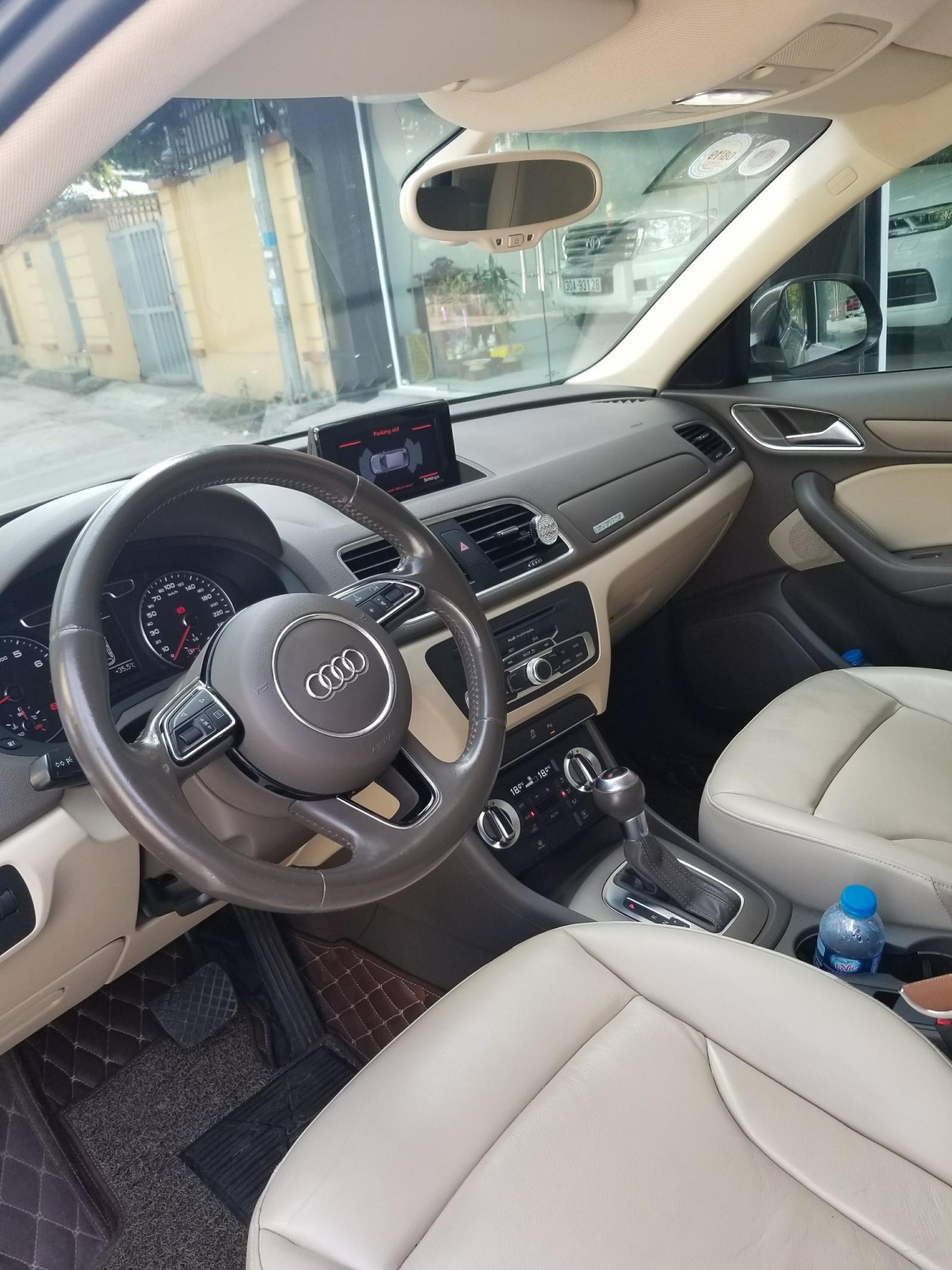 Audi Q3 2.0 TFSI 2014 - Cần bán Audi Q3 sx 2014, đăng ký lần đầu 2015 màu nâu