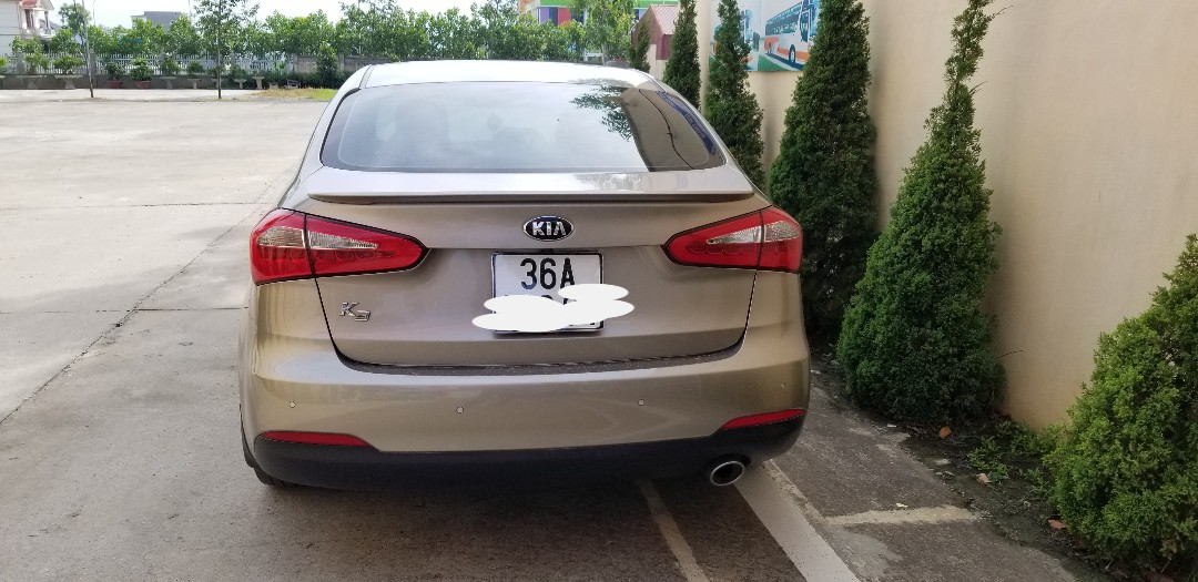 Kia K3 1.6AT 2015 - Bán Kia K3 1.6AT năm sản xuất cuối 2015, màu vàng cát