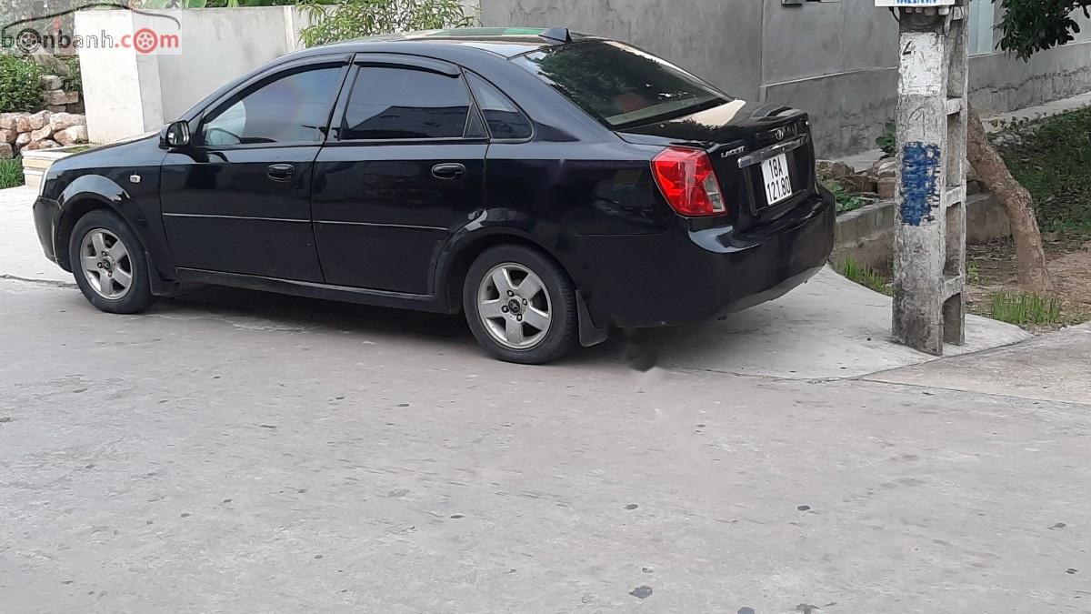 Daewoo Lacetti 2005 - Bán Daewoo Lacetti năm sản xuất 2005, màu đen, xe chạy ổn định