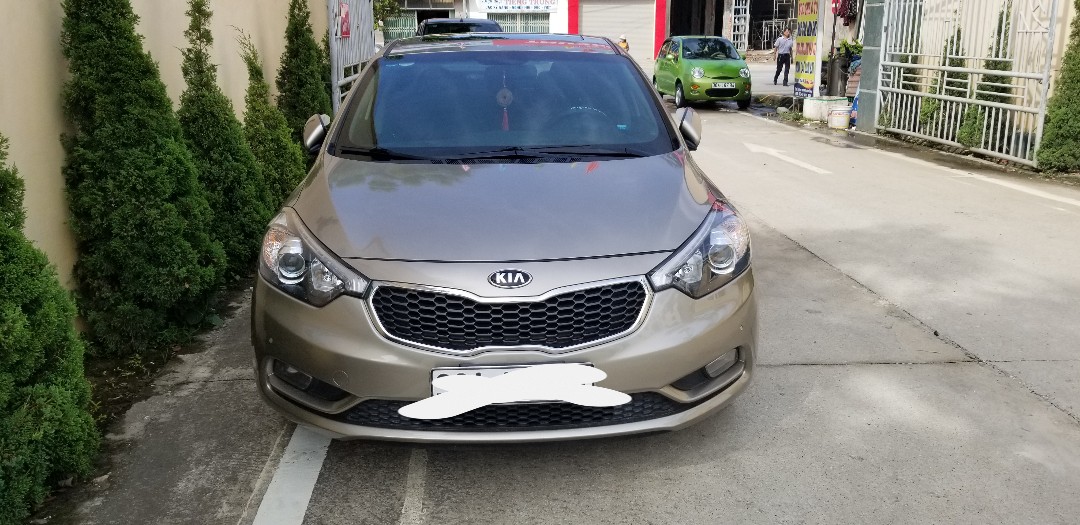 Kia K3 1.6AT 2015 - Bán Kia K3 1.6AT năm sản xuất cuối 2015, màu vàng cát