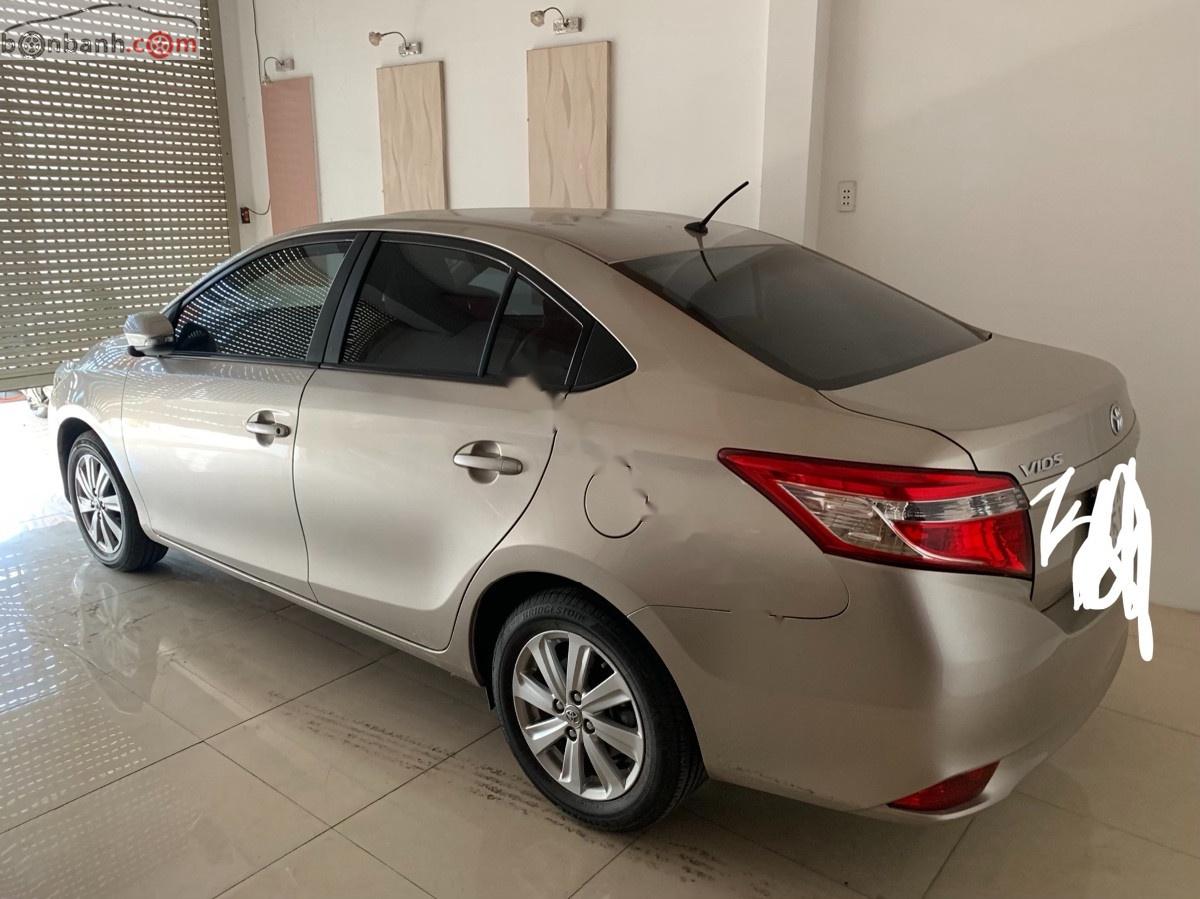 Toyota Vios 2014 - Bán ô tô Toyota Vios năm sản xuất 2014, màu nâu, 1 đời chủ, xe nghiêm chỉnh, không lỗi