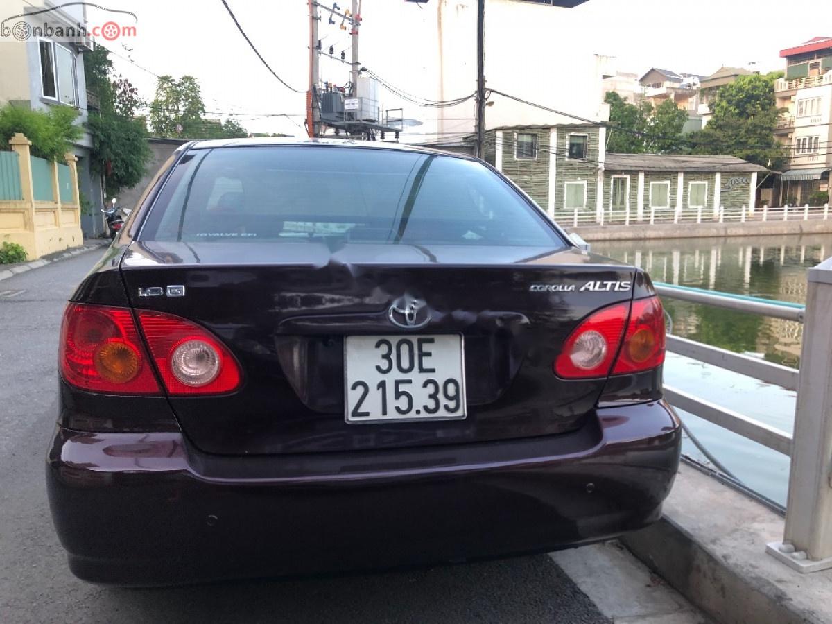 Toyota Corolla altis 1.8G MT 2002 - Cần bán Toyota Corolla altis 1.8G MT năm 2002, màu nâu xe gia đình, giá 210tr