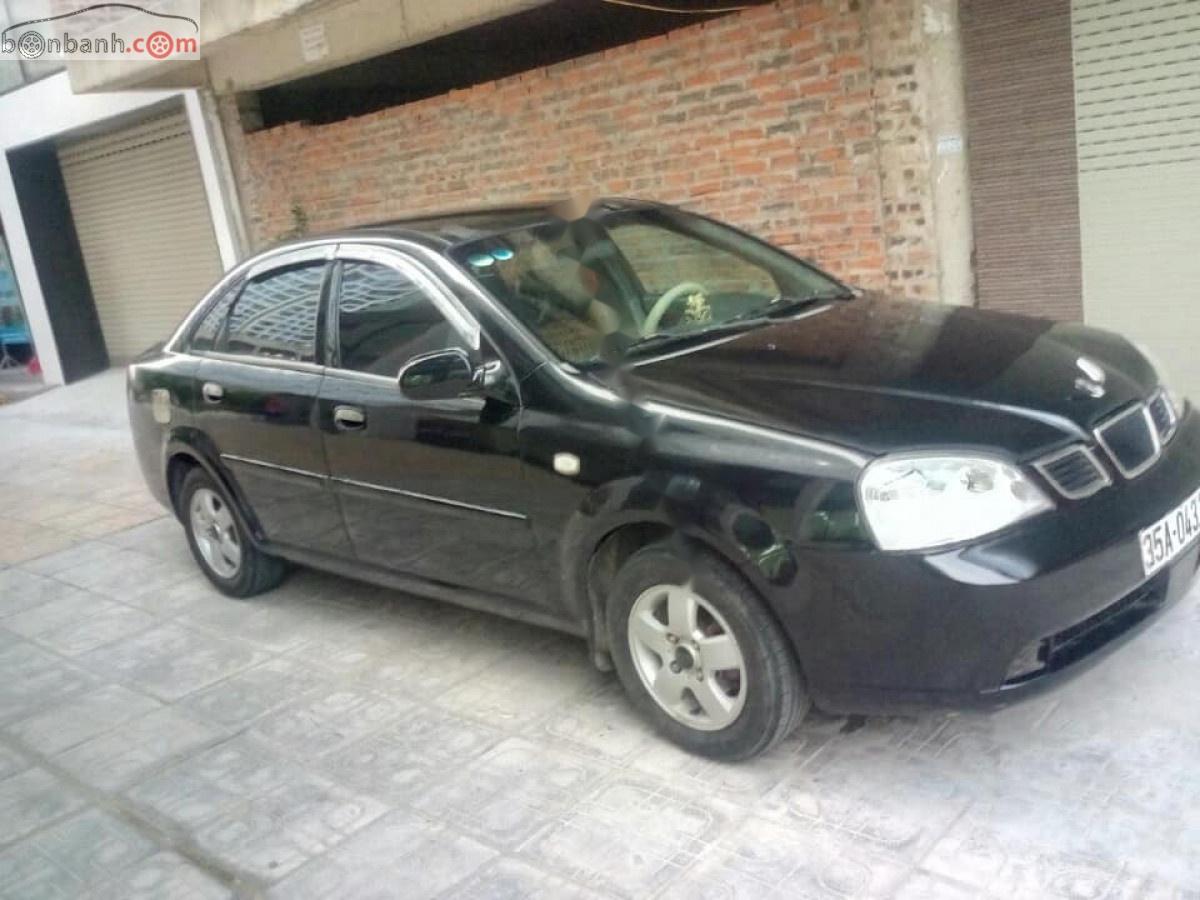 Daewoo Lacetti EX 1.6 MT 2004 - Bán Daewoo Lacetti màu đen, số sàn