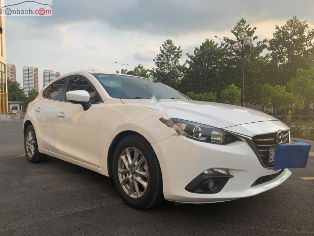 Mazda 3 2014 - Bán Mazda 3 Hatchback All New, đời 2015, đăng ký cuối 2014, xe nữ chạy kỹ, đang như mới