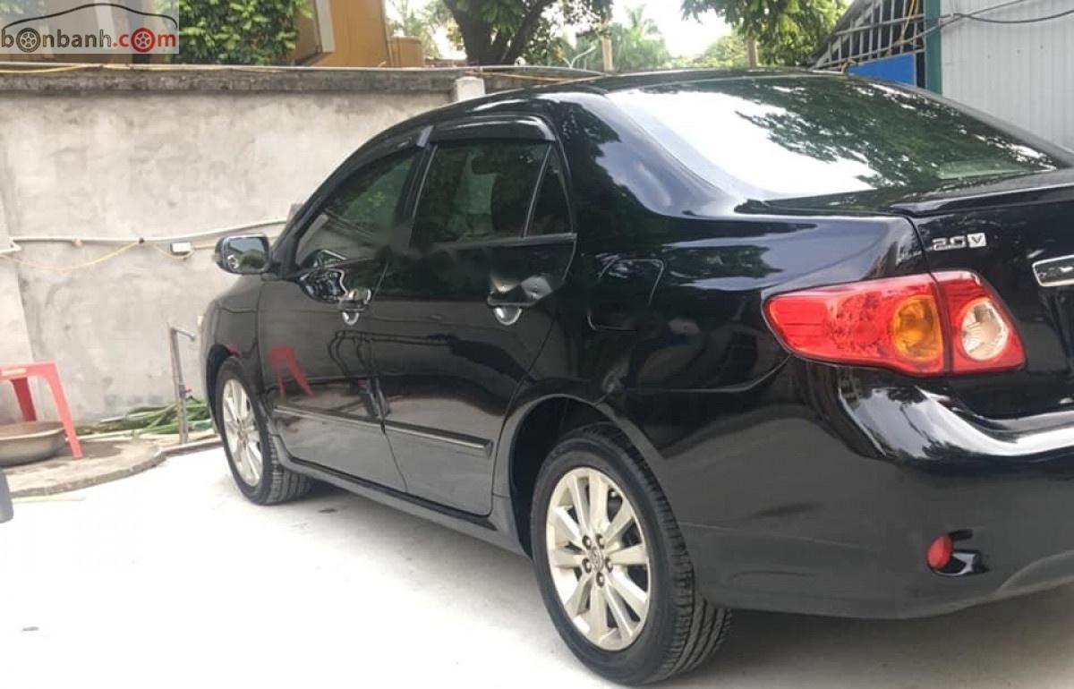 Toyota Corolla altis AT   2009 - Chính chủ bán Toyota Corolla altis AT đời 2009, màu đen, xe nhập