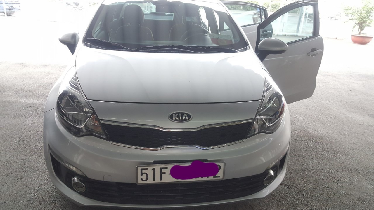 Kia Rio 1.4MT 2015 - Bán Kia Rio 1.4MT 2015, màu bạc, xe nhập chạy gia đinh