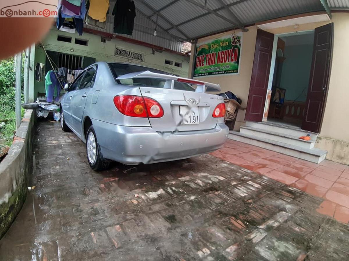 Toyota Corolla altis 2003 - Bán Toyota Corolla altis đời 2003, màu bạc, chính chủ, giá tốt