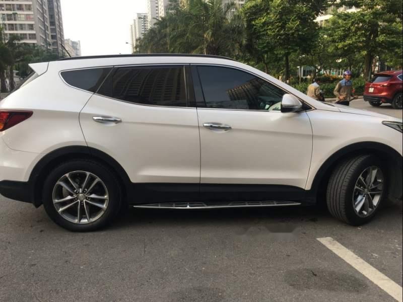 Hyundai Santa Fe  2.4 AT 2016 - Bán Hyundai Santa Fe 2.4 AT đời 2016, màu trắng số tự động, giá 930tr