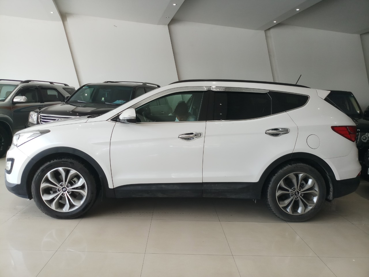 Hyundai Santa Fe 2.4AT 4WD  2015 - Cần bán xe Hyundai Santa Fe 2.4AT 4WD 7 chỗ, năm sản xuất 2015