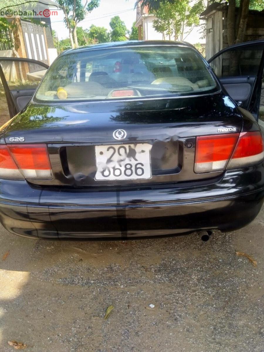 Mazda 626 2.0 MT 1995 - Bán Mazda 626 2.0 MT đời 1995, màu đen, xe nhập