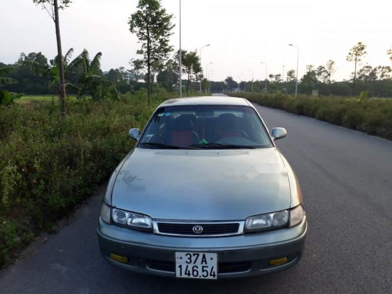 Mazda 626   1995 - Bán xe Mazda 626 sản xuất 1995, xe nhập, màu xanh bạc