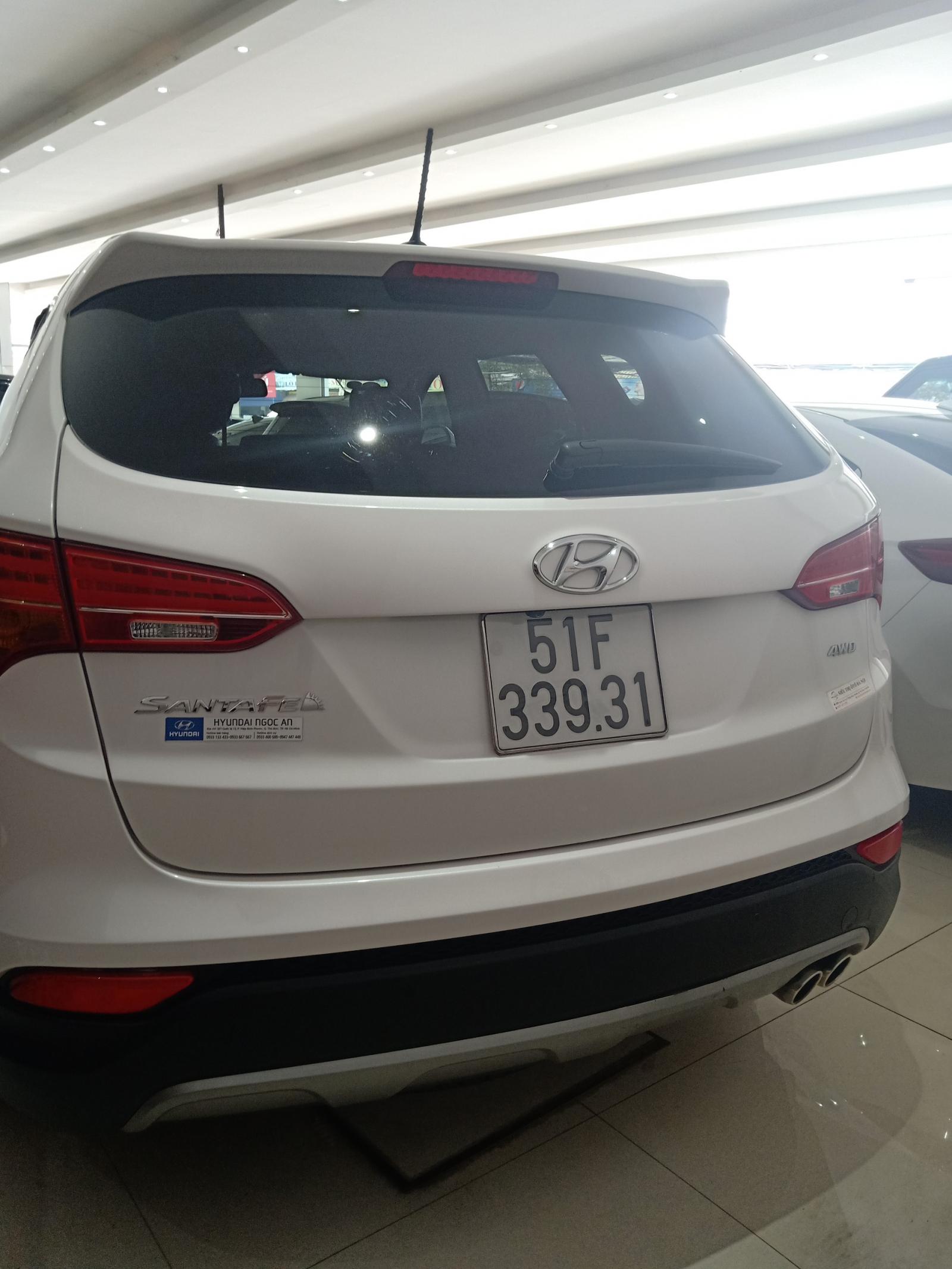 Hyundai Santa Fe 2.4AT 4WD  2015 - Cần bán xe Hyundai Santa Fe 2.4AT 4WD 7 chỗ, năm sản xuất 2015