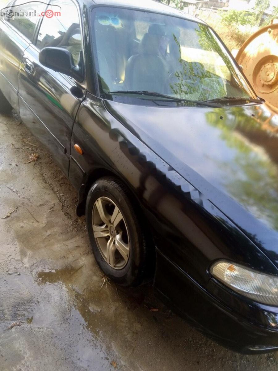 Mazda 626 2.0 MT 1995 - Bán Mazda 626 2.0 MT đời 1995, màu đen, xe nhập