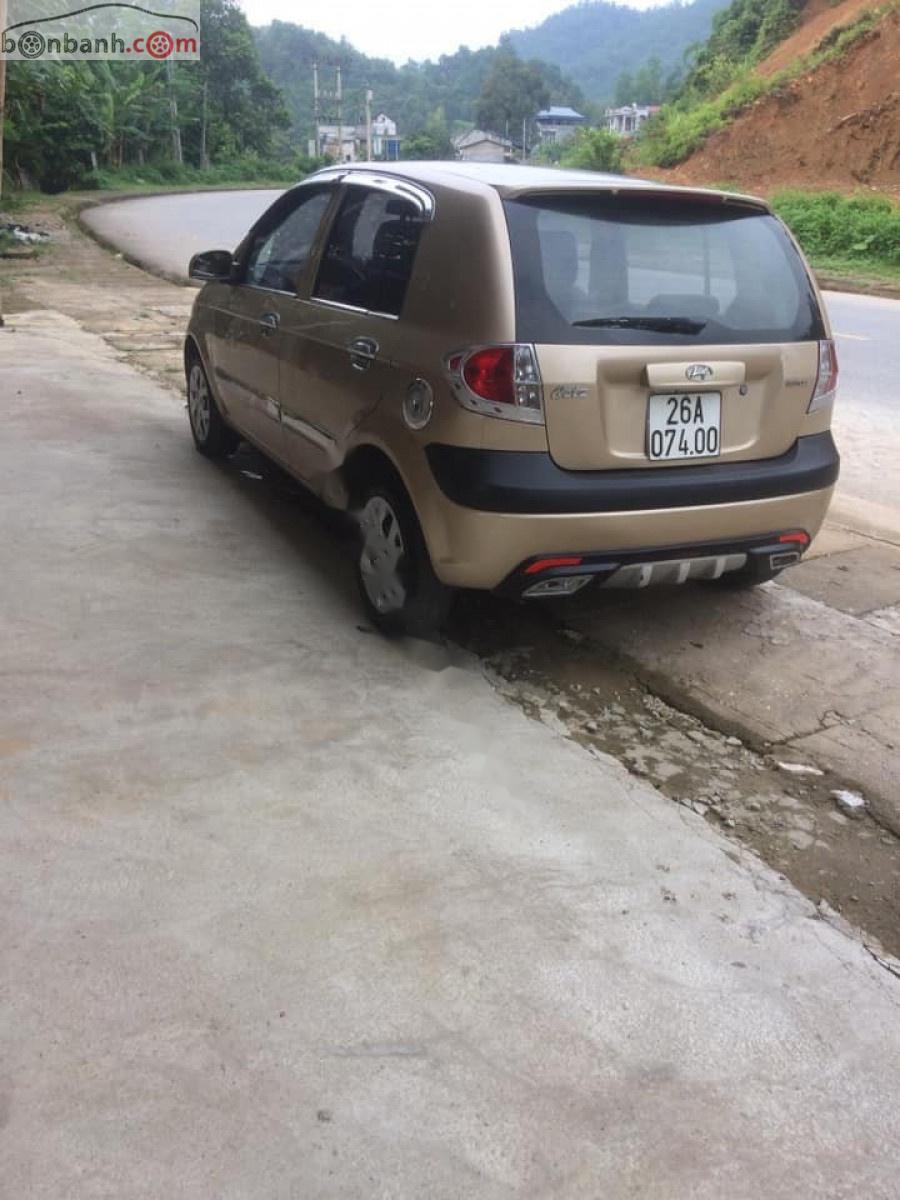 Hyundai Getz 1.1MT 2009 - Bán Hyundai Getz 1.1MT đời 2009, màu vàng, nhập khẩu