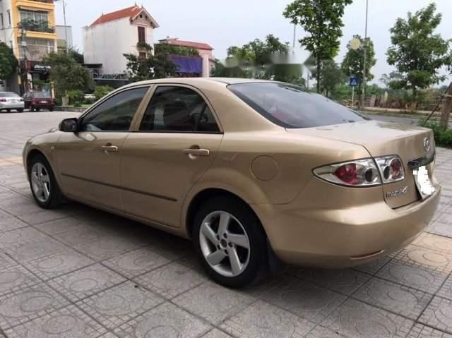 Mazda 6 2004 - Nhà bán Mazda 6 đời 2004, màu vàng, 265tr