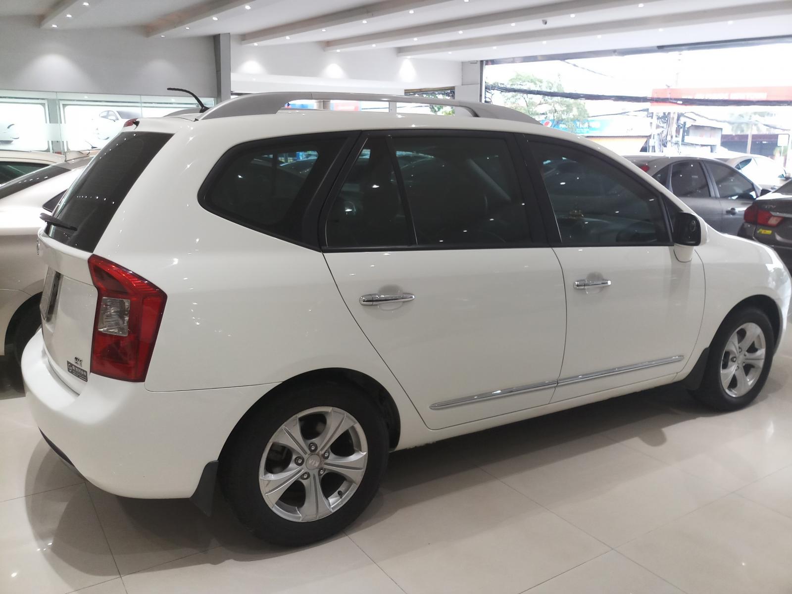 Kia Carens EX 2.0MT 2015 - Cần bán Kia Carens EX 2.0MT năm 2015, màu trắng, biển SG 866, 390 triệu