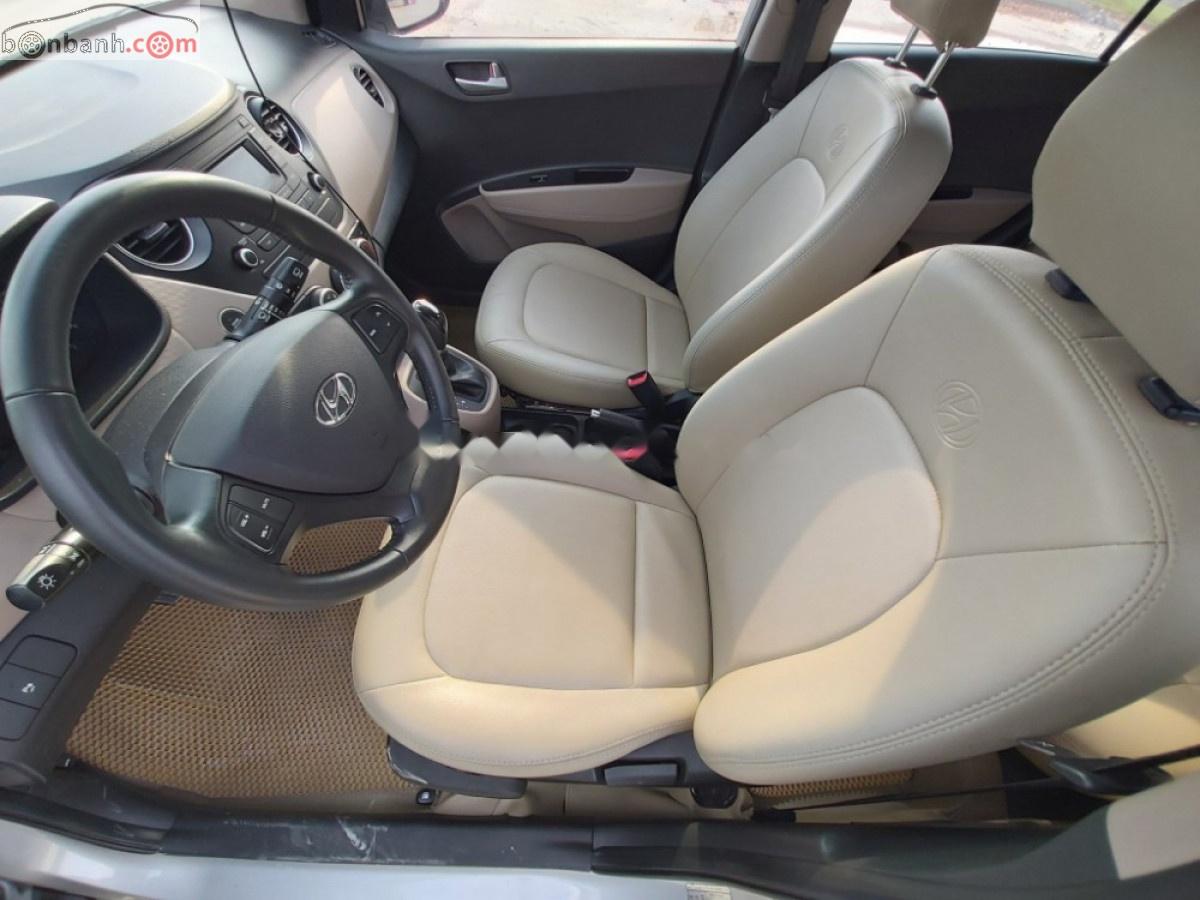 Hyundai Grand i10 1.0AT 2014 - Cần bán Hyundai Grand i10 1.0AT sản xuất 2014, màu bạc, nhập khẩu 