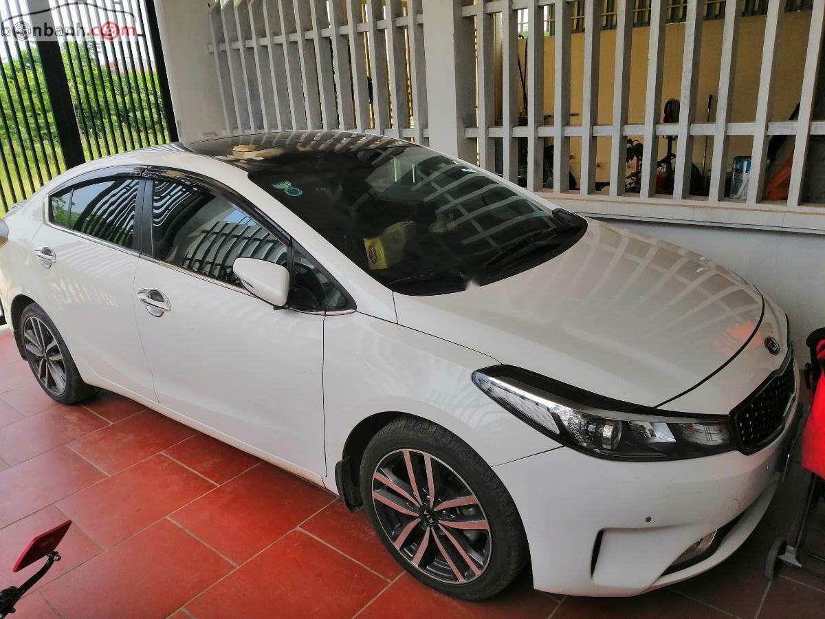 Kia Cerato 1.6 AT 2016 - Cần bán xe cũ Kia Cerato 1.6 AT năm 2016, màu trắng 