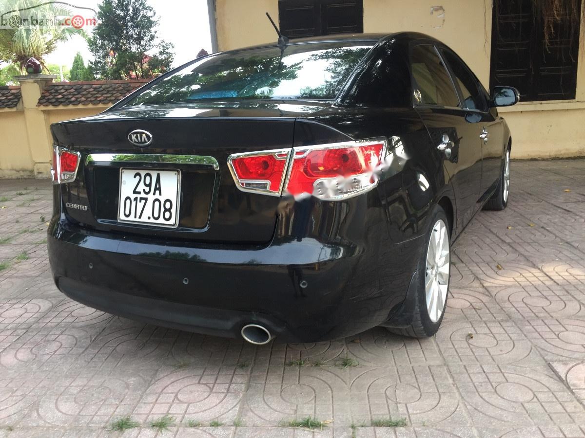 Kia Cerato 1.6 AT 2010 - Cần bán Kia Cerato 1.6 AT năm sản xuất 2010, màu đen, nhập khẩu 