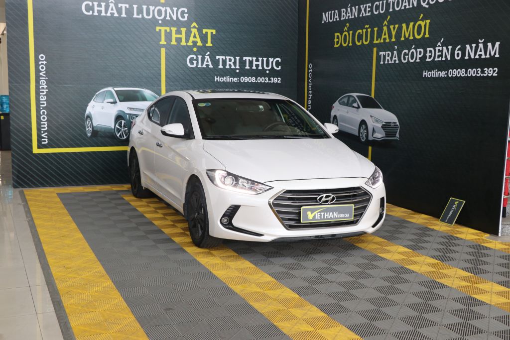 Hyundai Elantra GLS 1.6 AT 2016 - Cần bán Hyundai Elantra GLS 1.6 AT đời 2016, màu trắng, 566 triệu