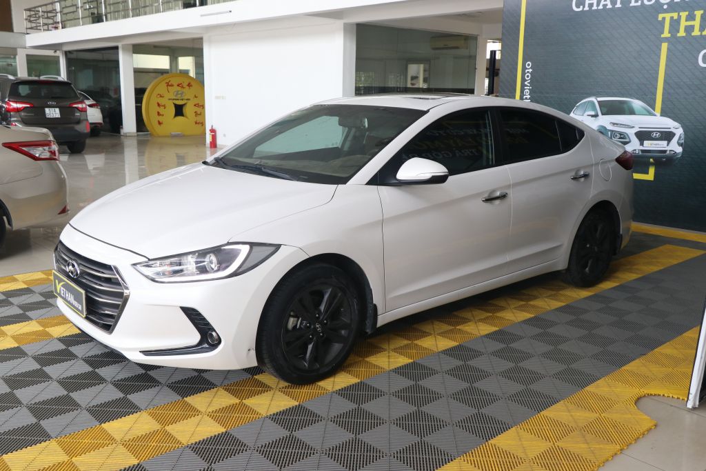 Hyundai Elantra GLS 1.6 AT 2016 - Cần bán Hyundai Elantra GLS 1.6 AT đời 2016, màu trắng, 566 triệu